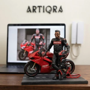 Our Work 2 Custom hand-painted 3D portrait sculpture of a motorcycle rider with a red Ducati bike, created by Artiqra.