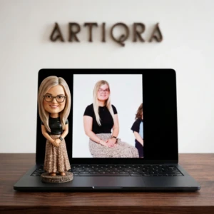 Our Work 45 Personalized chibi figurine of a blonde woman with glasses wearing a black top and patterned skirt, created by Artiqra.