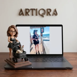Our Work 26 Custom chibi sculpture of a woman pushing her pet dogs in a stroller, recreated from a personal photograph by Artiqra.