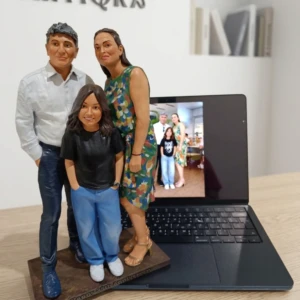Our Work 28 Custom family 3D portrait sculpture featuring a father, mother and daughter beside their reference photo, made by Artiqra.