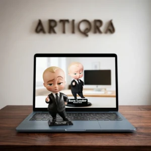 Our Work 17 Custom Baby Boss 3D bobblehead figurine in suit with "Born Leader" base plate by Artiqra UAE personalized desk decor