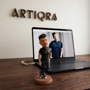 Our Work 25 Personalized bobblehead of a man in a black polo shirt and jeans posing casually with crossed legs, created by Artiqra.