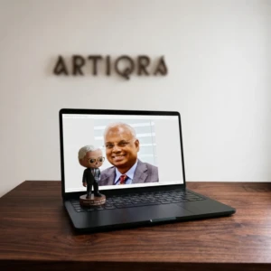 Our Work 43 Personalized retirement bobblehead of a businessman wearing a suit and sunglasses, created from his photograph by Artiqra.