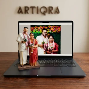 Our Work 31 Custom 3D wedding couple portrait figurine in traditional Indian bridal saree and kurta with flower garlands by Artiqra UAE.